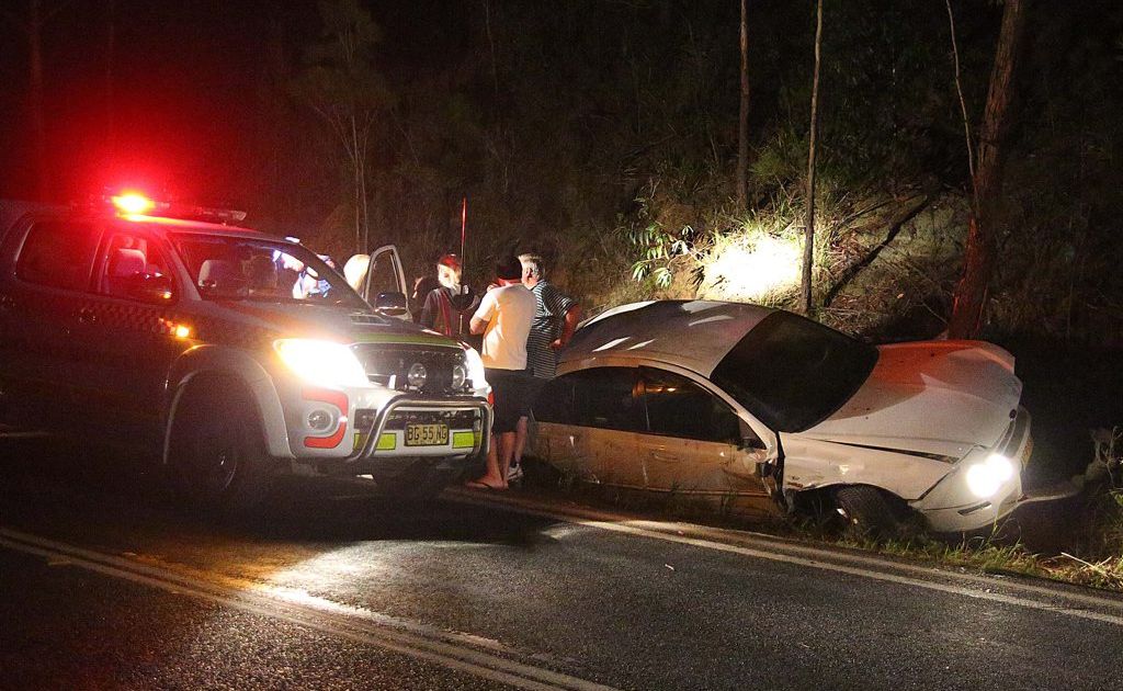 Two people were hospitalized following a two car crash on the Pacific Highway near Emerald Beach, 15km north of Coffs Harbour late last night. Lights continued to blaze into the night as police take details. Two people were hospitalized following a two car crash on the Pacific Highway near Emerald Beach, 15km north of Coffs Harbour late last night. Lights continued to blaze into the night as police take details.
